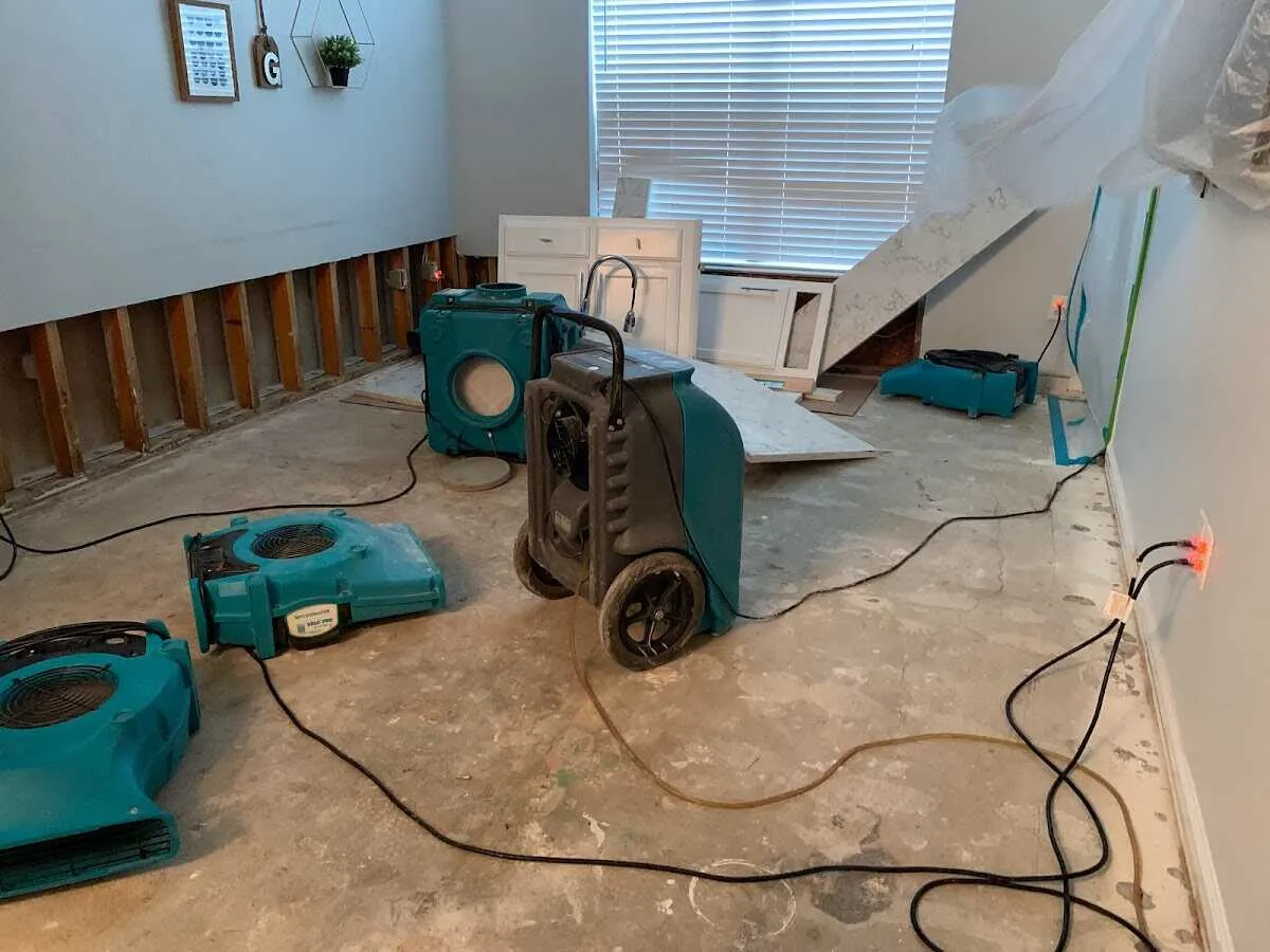 Dehumidifier in flood-cut room for Water Damage Restoration in Dearborn Heights